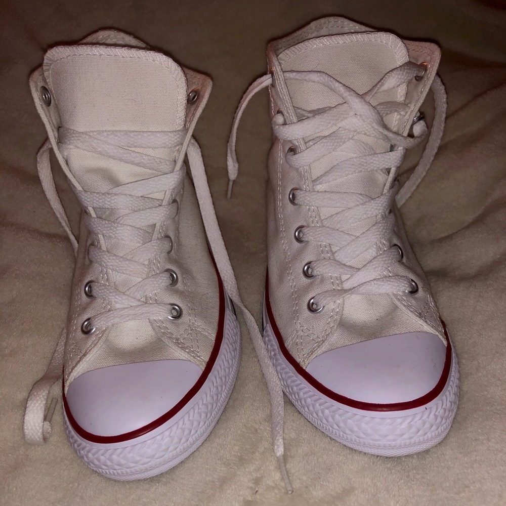 New without tags white high top converse.